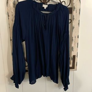 Wonderly navy blue long sleeve top. Lightweight with beautiful sleeve details.XL